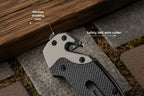 Stainless steel folding knife with wire cutter and pressure point features