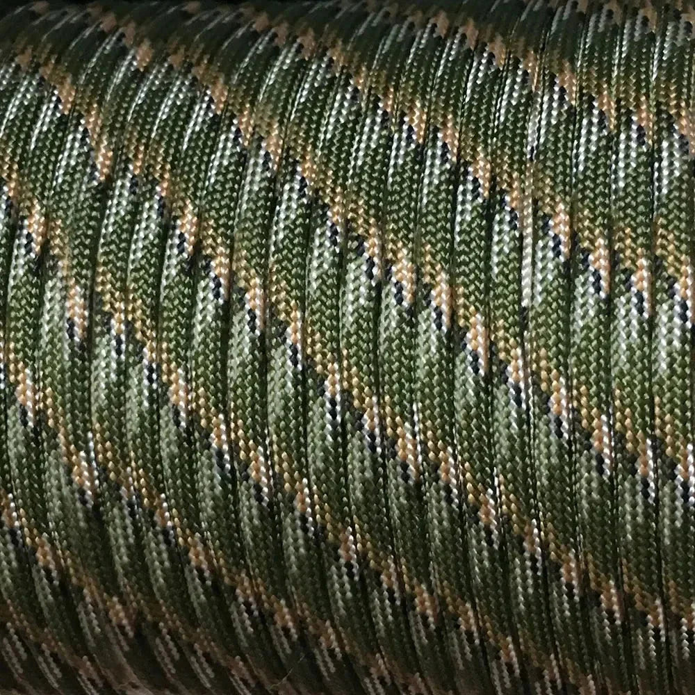 Close-up of green camouflage-patterned fabric paracord