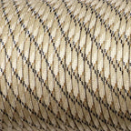 Close-up of braided rope with a beige and black pattern