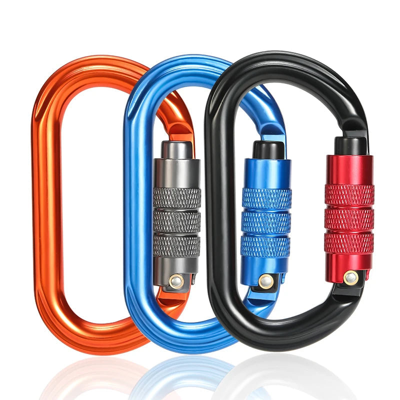 Three colorful carabiners on a white background - offered by the best hiking and climbing gear store in New York, The Adirondack Tool Company.
