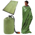 Green emergency bag from The Adirondack Tool Co. with drawstring bag, shown on a man.