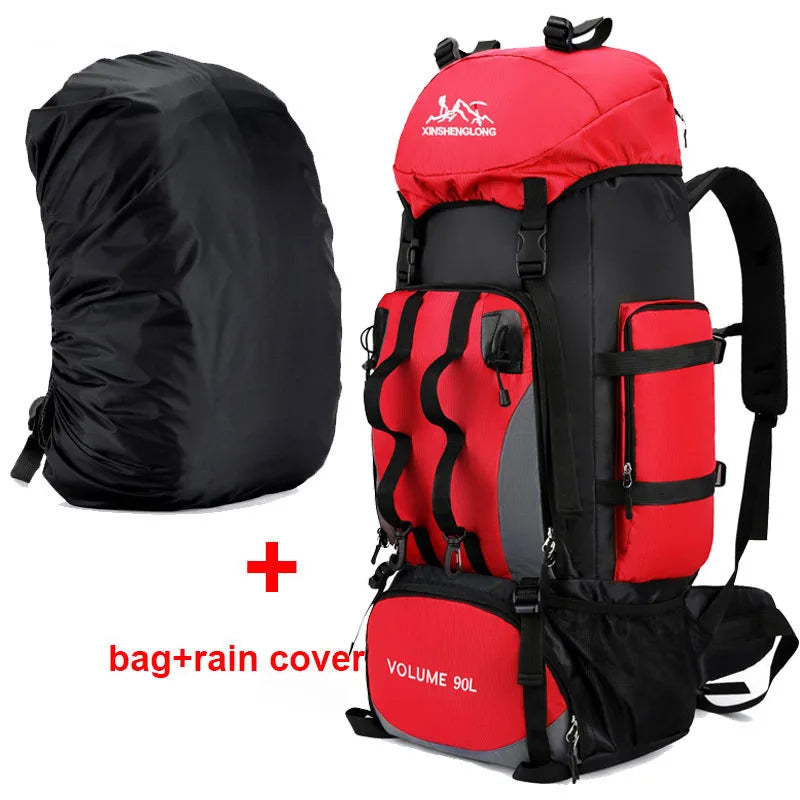 Red hiking backpack with black rain cover on a white background