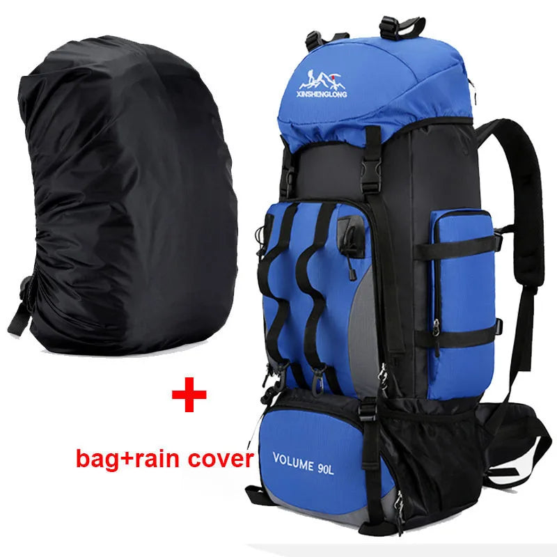 Blue hiking backpack with black rain cover on a white background