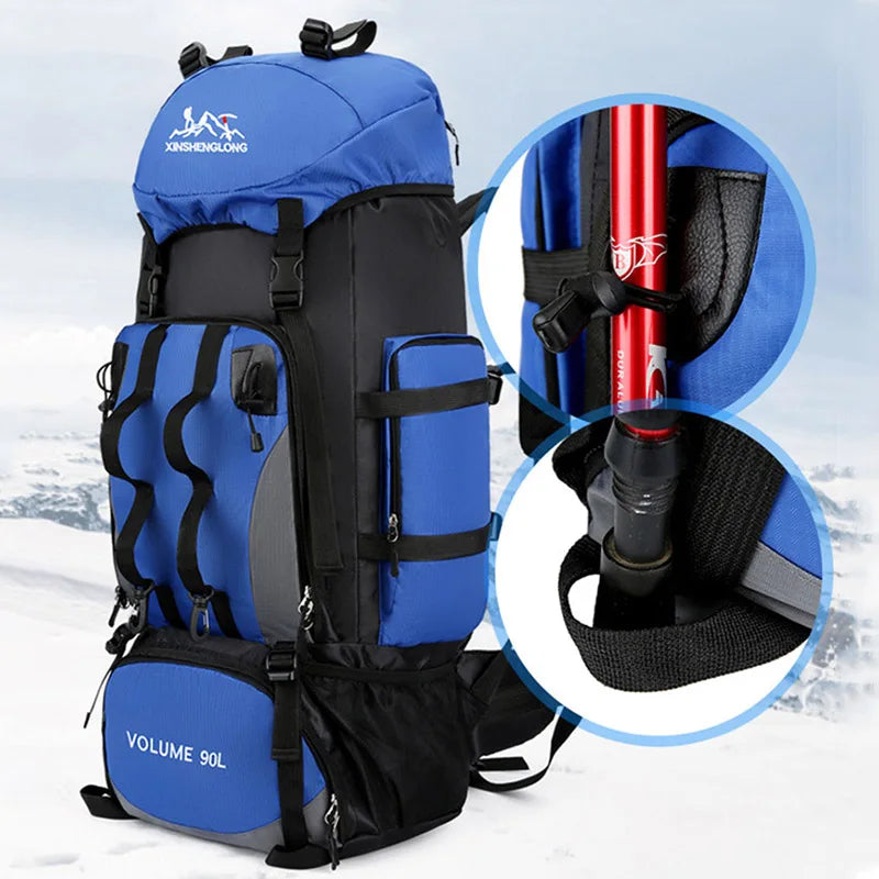 Blue hiking backpack with a close-up of a trekking pole on a snowy background