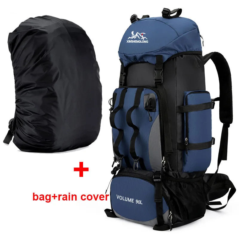 Blue hiking backpack with black rain cover on a white background