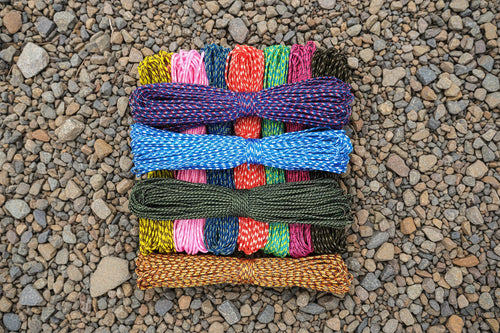 Assortment of colorful 2mm paracord rope - offered by the best hiking and camping gear store in Vermont, The Adirondack Tool Co.