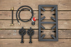 Set of outdoor cooking equipment including a burner, hose, and control valve on a white background. Offered by The Adirondack Tool Co.