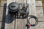 Portable gas stove with hose on a white background by The Adirondack Tool Co.