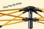 Black and orange umbrella-like tent structure with text on a beige background