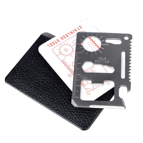 Stainless steel multitool card with various labels on a white background