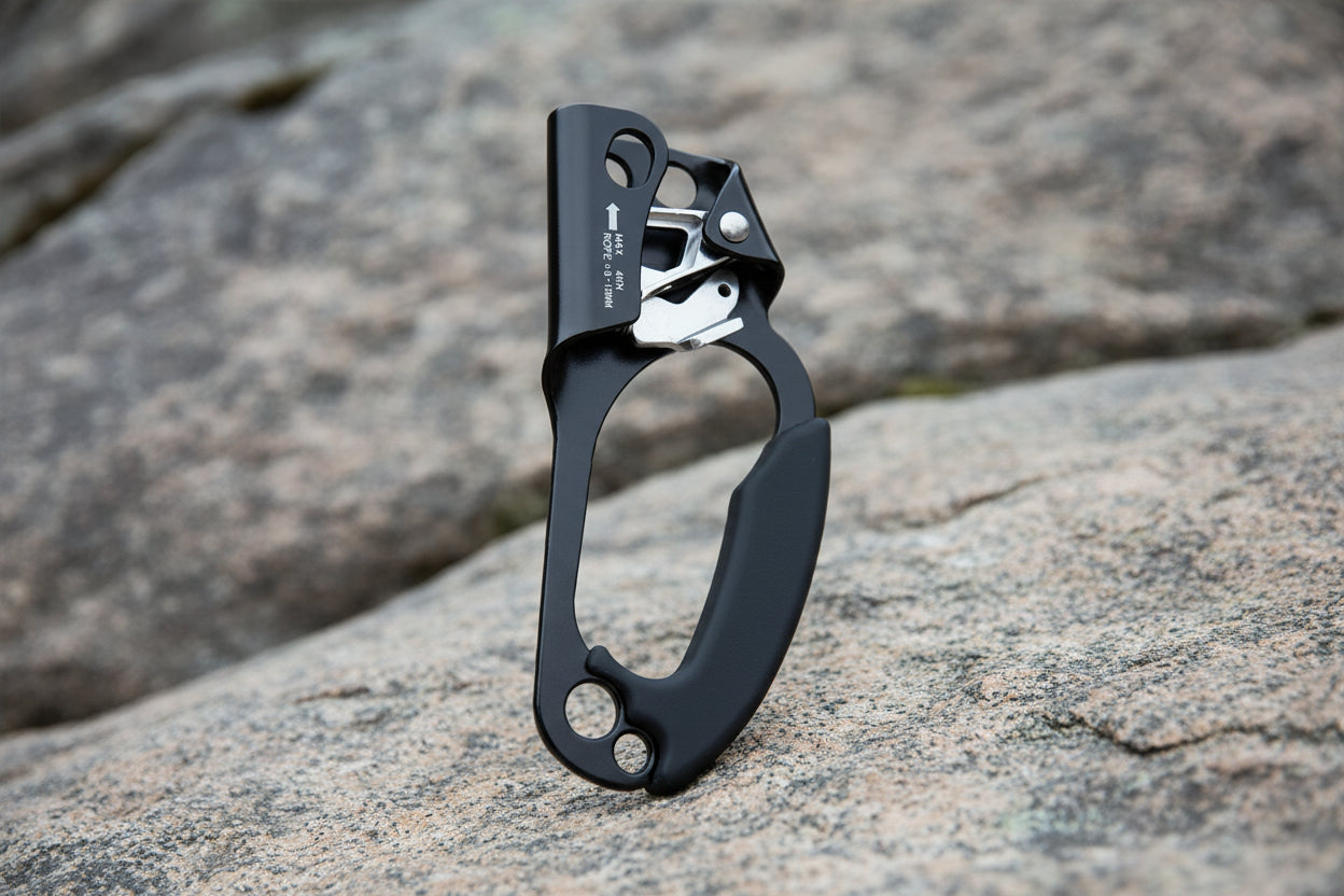 Black and silver carabiner on a white background - offered by the best climbing gear store in the northeast, The Adirondack Tool Co.