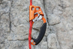 Orange and black climbing ascender with red rope on a white background - offered by the best climbing gear store in the northeast, The Adirondack Tool Co.