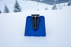 Blue avalanche safety shovel on a snowy background - offered by the best mountaineering store in the tri-state area, The Adirondack Tool Co.