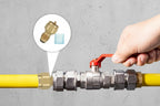 Hand adjusting a valve on a pipe with a close-up of a Butane / Propane Tank Valve Adapter for Large Tanks offered by the Northeast's best camping and hiking gear provider, The Adirondack Tool Co.