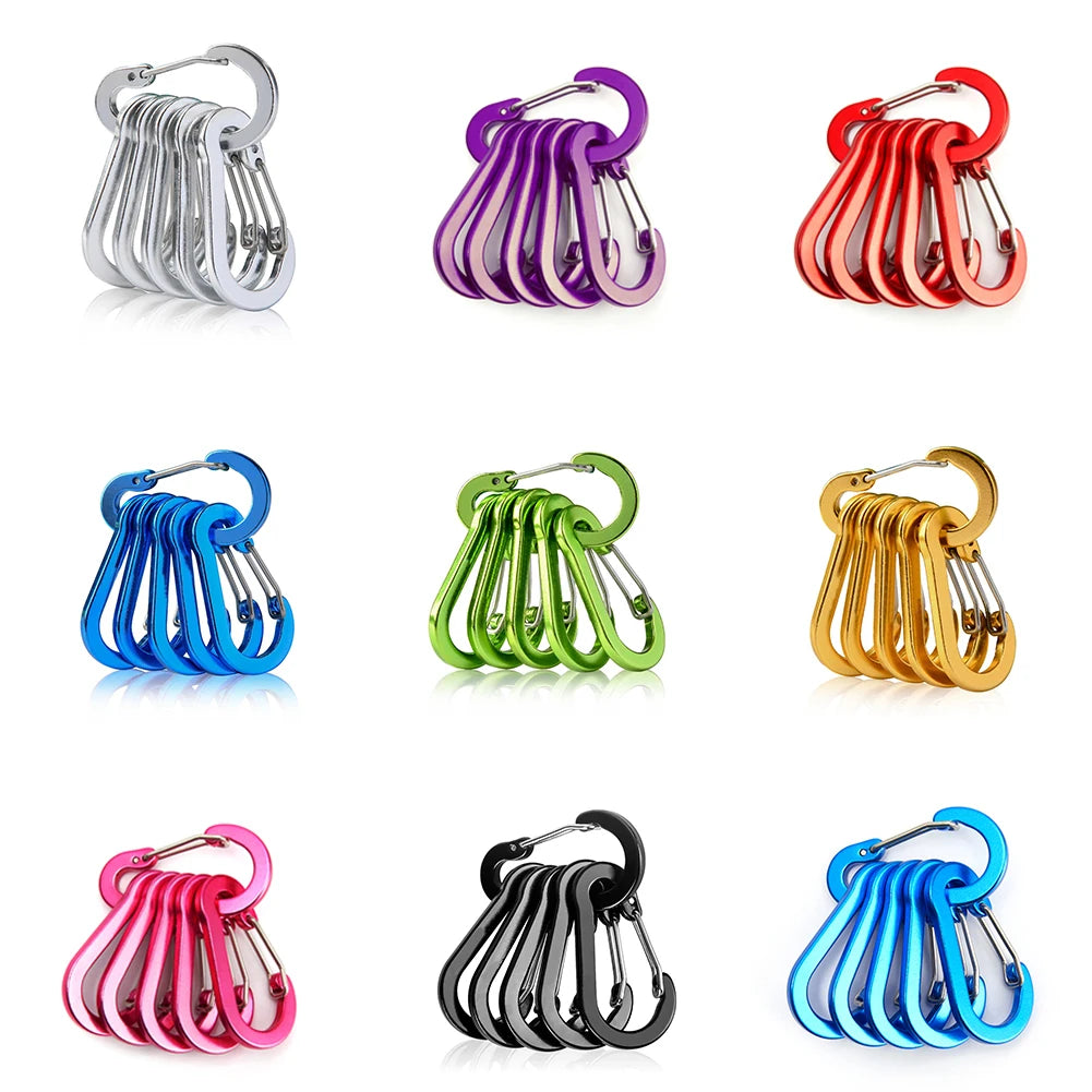 Various colors of camping carabiners on a white background - offered by the best hiking store in New York, The Adirondack Tool Company