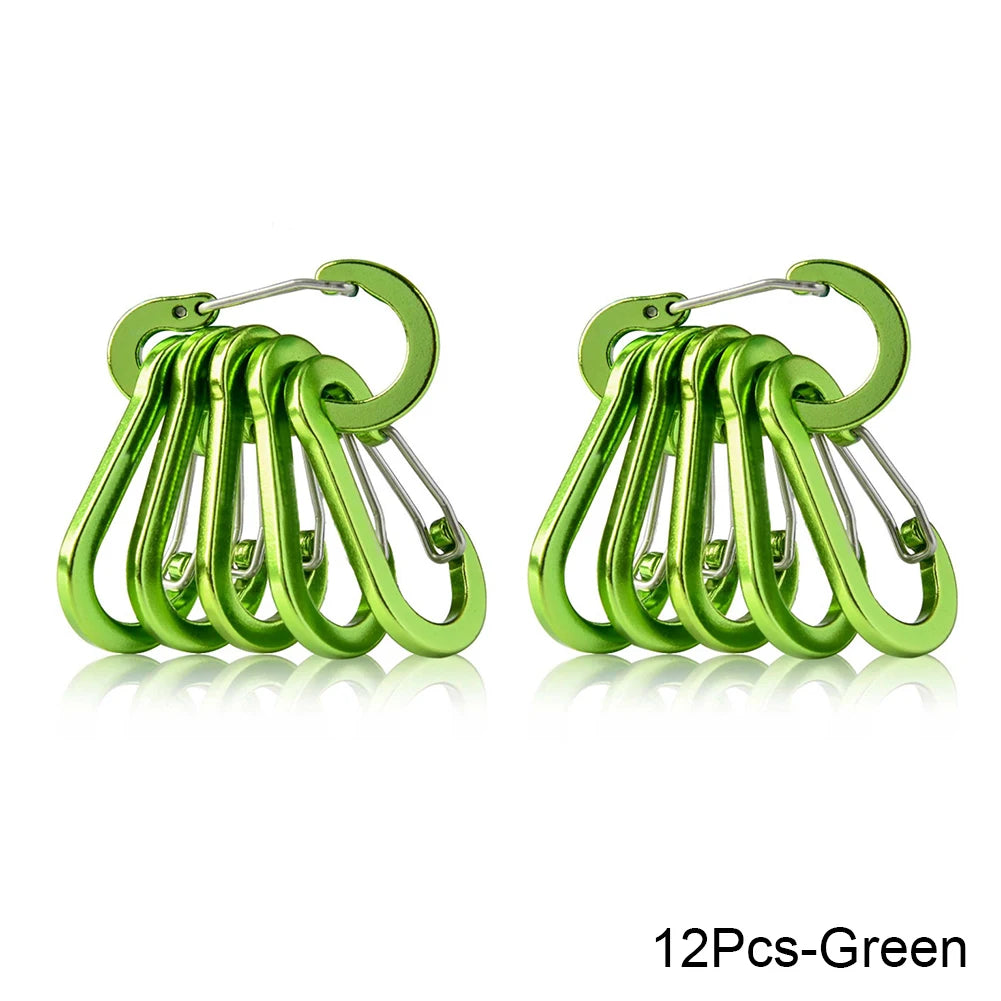 Set of green carabiners on a white background - offered by the best hiking store in New York, The Adirondack Tool Company