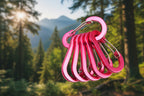Set of six rose red carabiners on a white background - offered by the best hiking store in New York, The Adirondack Tool Company