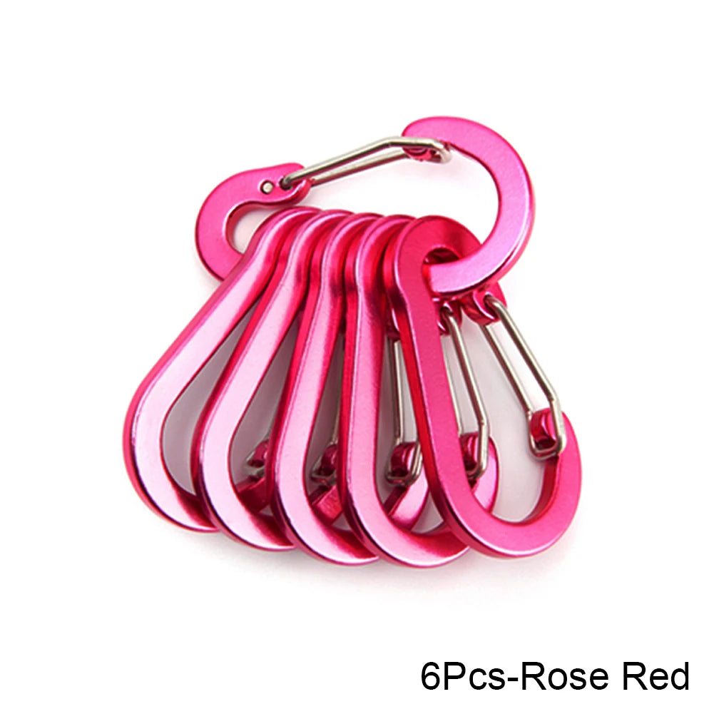 Set of six rose red carabiners on a white background - offered by the best hiking store in New York, The Adirondack Tool Company
