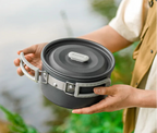 An aluminum pot with a foldable grip - offered by the best camping gear store in New York, The Adirondack Tool Company
