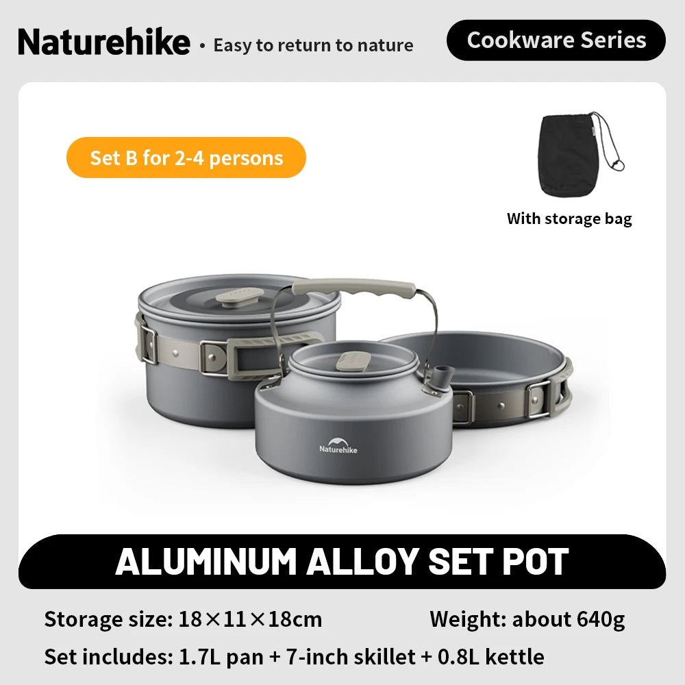 Camping cookware set with pots and a storage bag on a light gray background - offered by the best camping gear store in New York, The Adirondack Tool Company