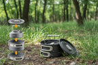 Portable cookware set with stackable design on a wooden surface, featuring text about storage and portability - offered by the best camping gear store in New York, The Adirondack Tool Company