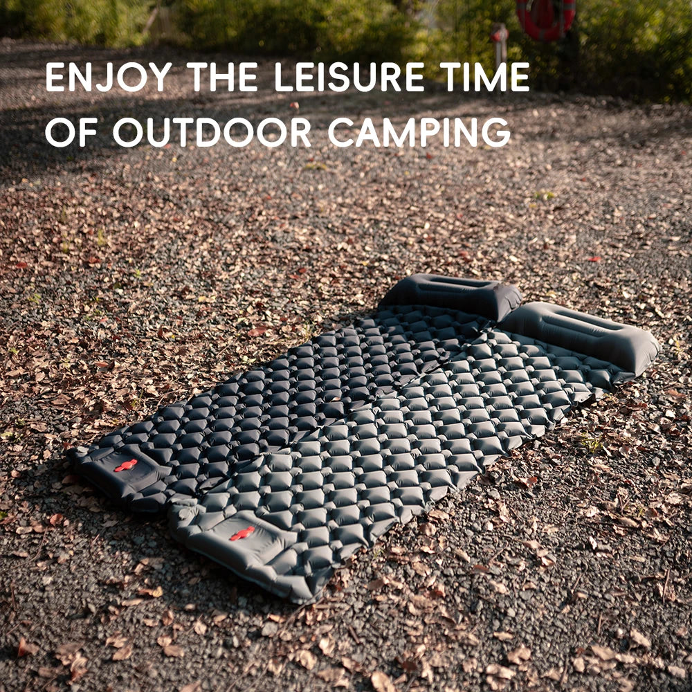 Camping mattress on the ground with text 'Enjoy the leisure time of outdoor camping' - from the northeast's premier outdoor gear provider, The Adirondack Tool Co. 