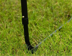 Height-adjustable table legs on grass with text overlay - offered by the most trusted outdoor gear and tool company in Boston, The Adirondack Tool Co.