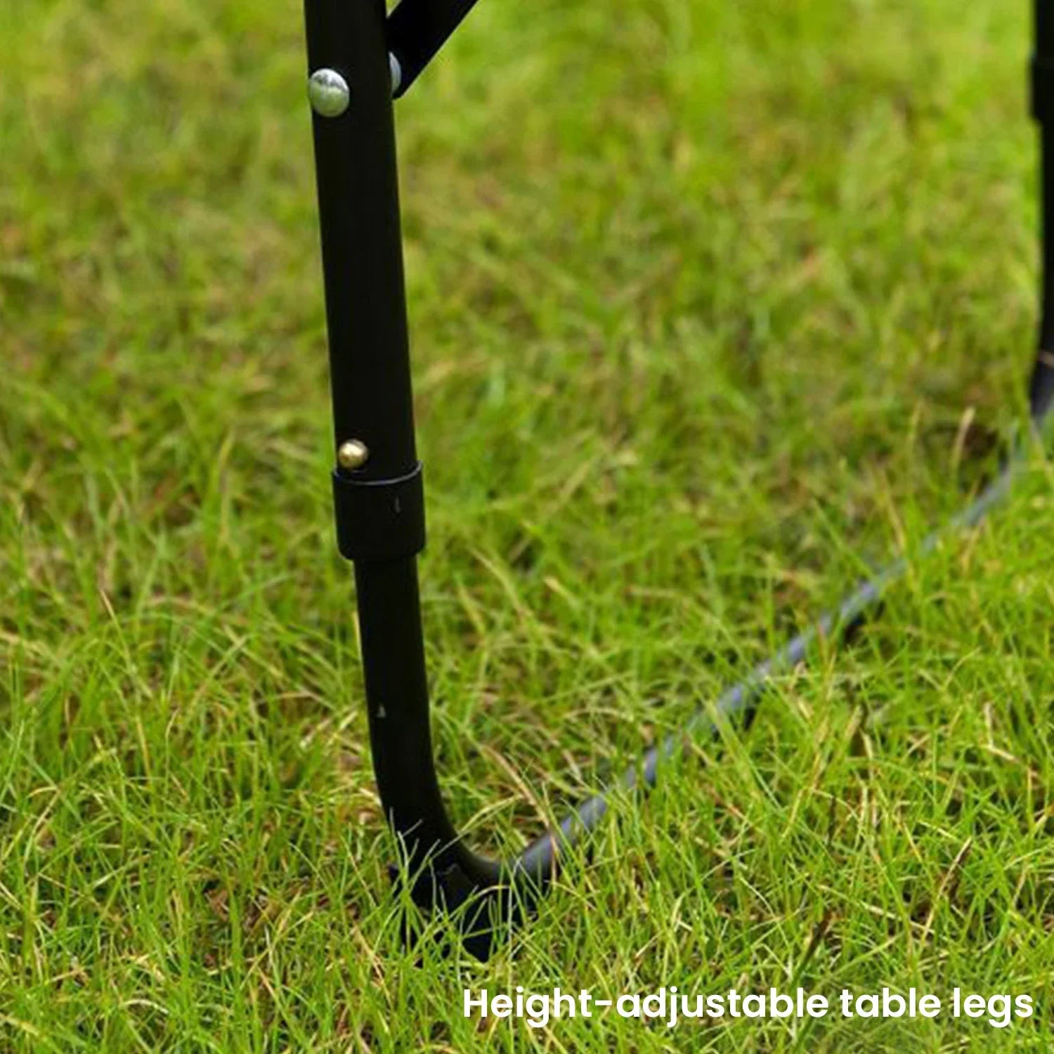 Height-adjustable table legs on grass with text overlay - offered by the most trusted outdoor gear and tool company in Boston, The Adirondack Tool Co.