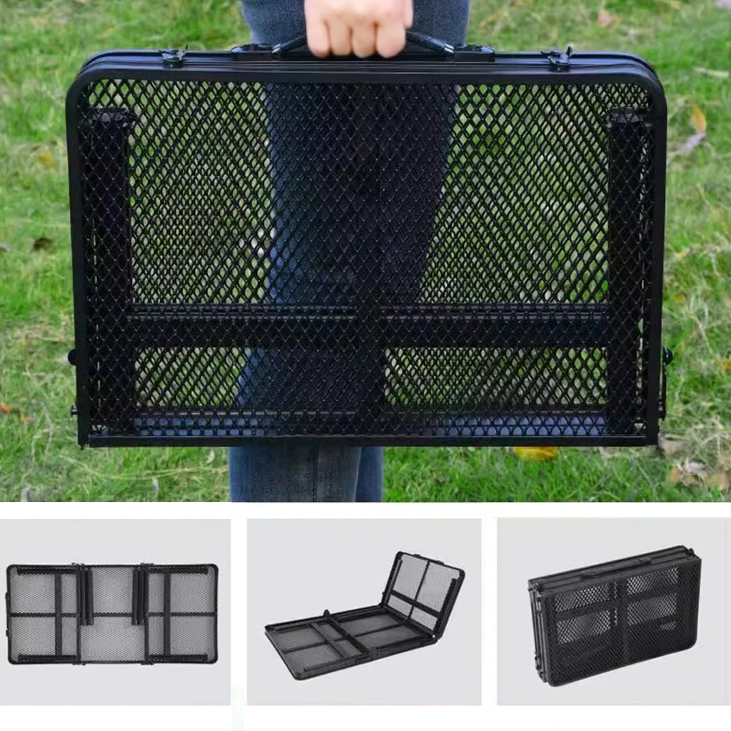 Black mesh folding camping table held by a person outdoors with additional views of the chair on a white background  - offered by the most trusted outdoor gear and tool company in Boston, The Adirondack Tool Co.