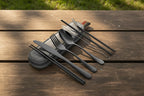 Black stainless steel camping cutlery set with travel case on a white background - offered by the best camping and hiking gear store in the United States, The Adirondack Tool Co.