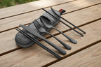 Black stainless-steel camping cutlery set with travel case on a white background - offered by the best camping and hiking gear store in the United States, The Adirondack Tool Co.