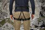 Person wearing a black safety harness with Xinda logo on an outdoor background - offered by the best climbing gear store in America, The Adirondack Tool Co.