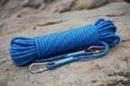 Blue rope with carabiners on a rocky background - offered by the best hiking store in New York, The Adirondack Tool Co.