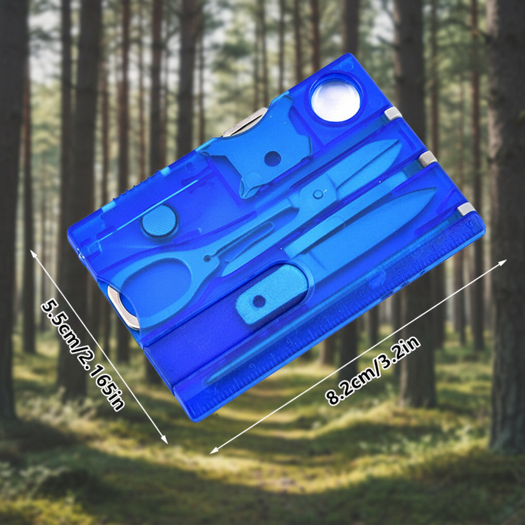Blue multi-tool card with scissors and knife on a forest background - offered by the best outdoor gear store in New York, the Adirondack Tool Company