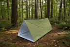 Olive green emergency tent with packaging on a white background