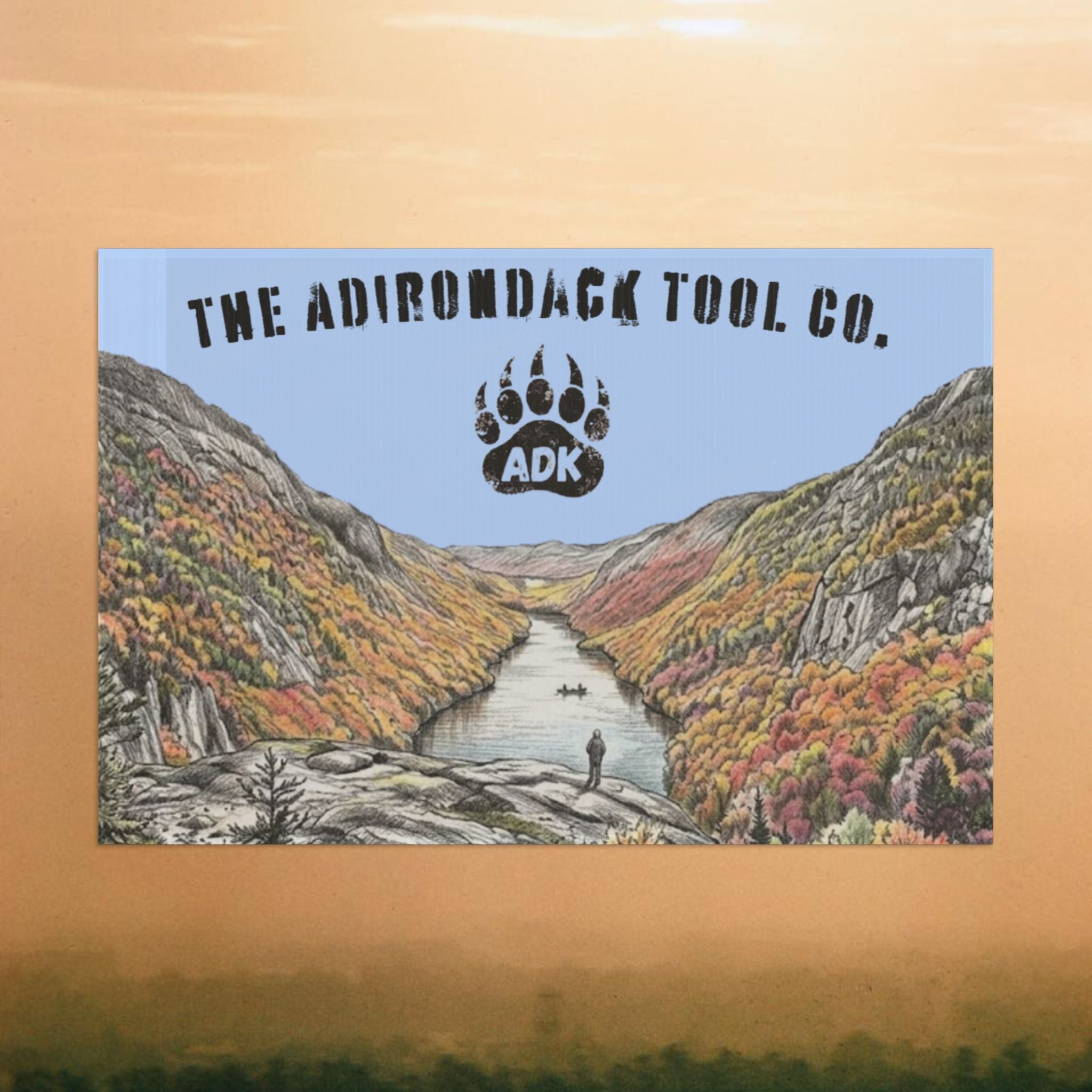 Flag of The Adirondack Tool Co. with a mountain landscape and ADK logo
