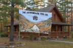 Flag with a scenic design and 'The Adirondack Tool Co.' branding