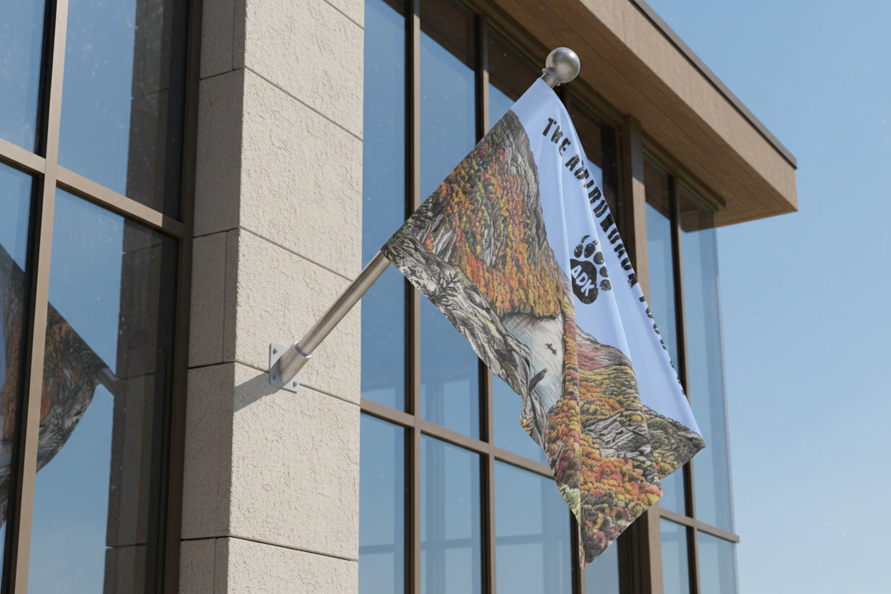 Flag with mountain and forest design on building