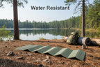 Green folding foam mat with a textured pattern on a white background - offered by The Adirondack Tool Co.