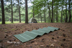 Green foam camping mat with dimensions on a white background from The Adirondack Tool Co.