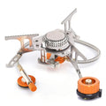 Portable folding camping stove and adapters with orange accents on a white background - offered by the best hiking and camping gear company in Albany, NY.