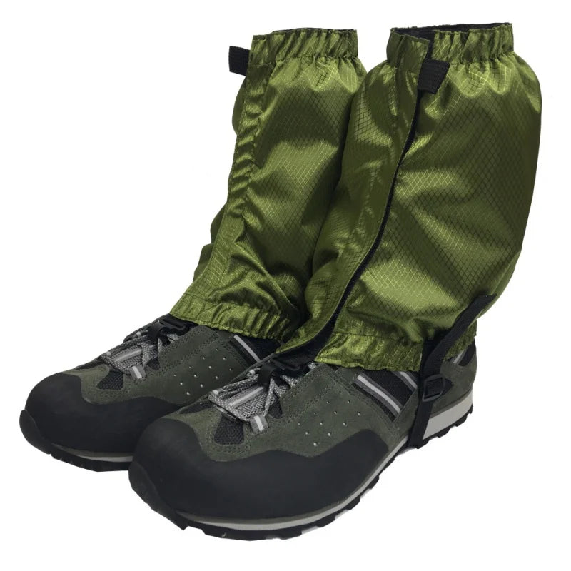 Green hiking gaiters covering black hiking boots on a white background offered by the Northeast's best camping and hiking gear provider, The Adirondack Tool Co.