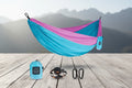 Blue and pink hammock with accessories on a white background - offered by the best camping gear store in the northeast, the Adirondack Tool Co.