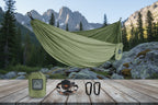 Green hammock with accessories on a white background - offered by the best camping gear store in the northeast, the Adirondack Tool Co.