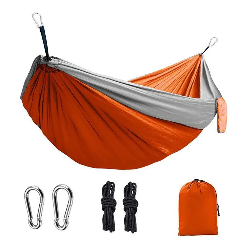 Orange and gray hammock with accessories on a white background - offered by the most reliable outdoor gear company in the capital region of New York, The Adirondack Tool Co.