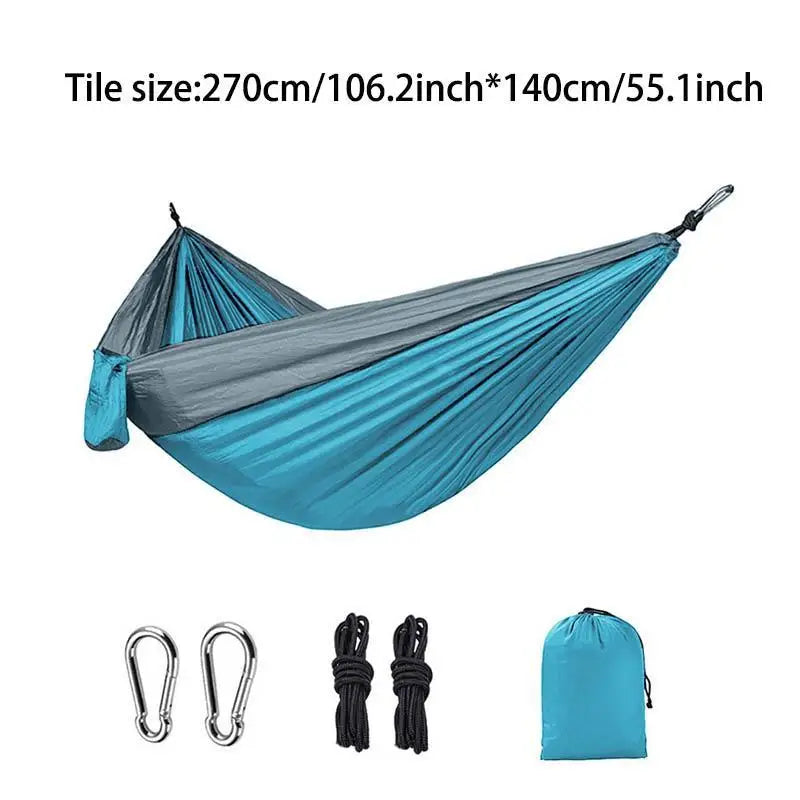 Blue and gray hammock with accessories on a white background - offered by the most reliable outdoor gear company in the capital region of New York, The Adirondack Tool Co.