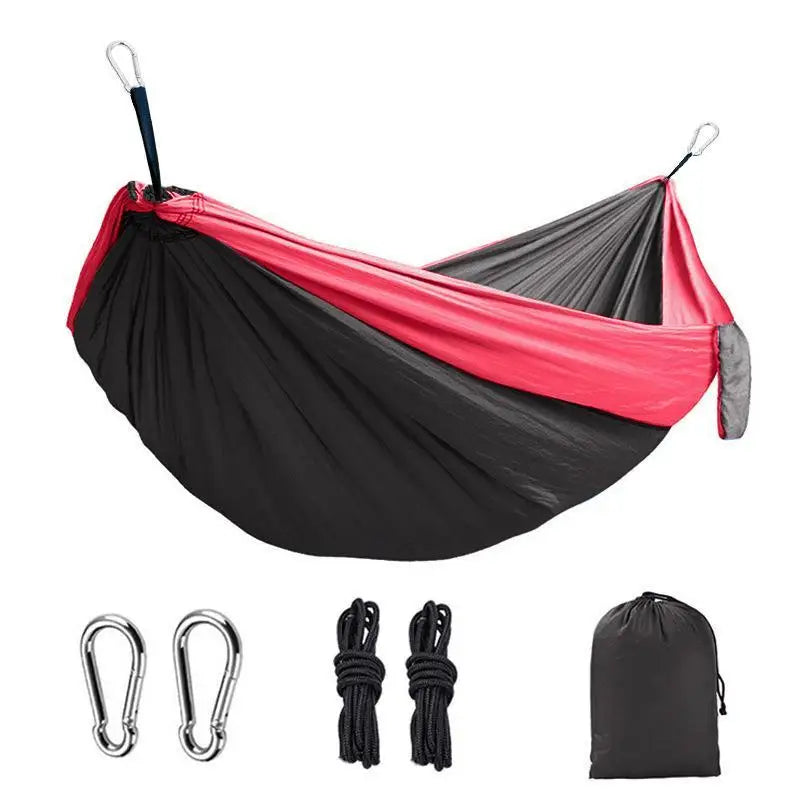 Black and pink hammock with accessories on a white background - offered by the most reliable outdoor gear company in the capital region of New York, The Adirondack Tool Co.