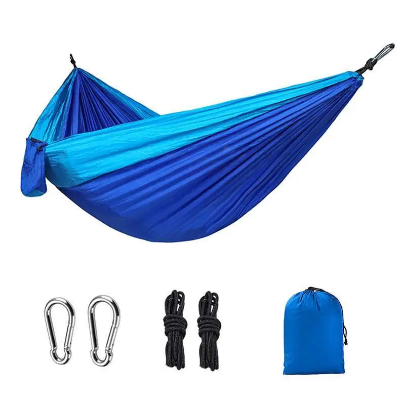 Blue hammock with accessories on a white background - offered by the most reliable outdoor gear company in the capital region of New York, The Adirondack Tool Co.