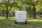 White ice box / cooler with soft-ride wheels on a white background - offered by the premier camping and hiking gear store in the Northeastern United States, The Adirondack Tool Co.