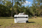 White cooler with wheels and a can of beer on a white background - offered by the premier camping and hiking gear store in the Northeastern United States, The Adirondack Tool Co.